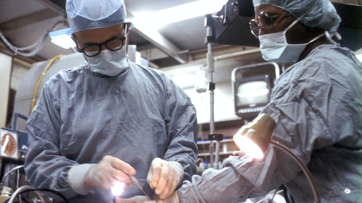 Medical professionals in an operating room — representing the advanced care available for healthy aging