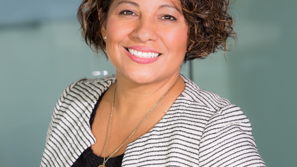 A warm, approachable healthcare professional — representing the human side of mental health care